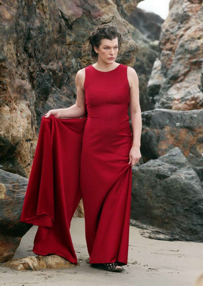 Milla Jovovich in Red Dress on Photoshoot in Malibu