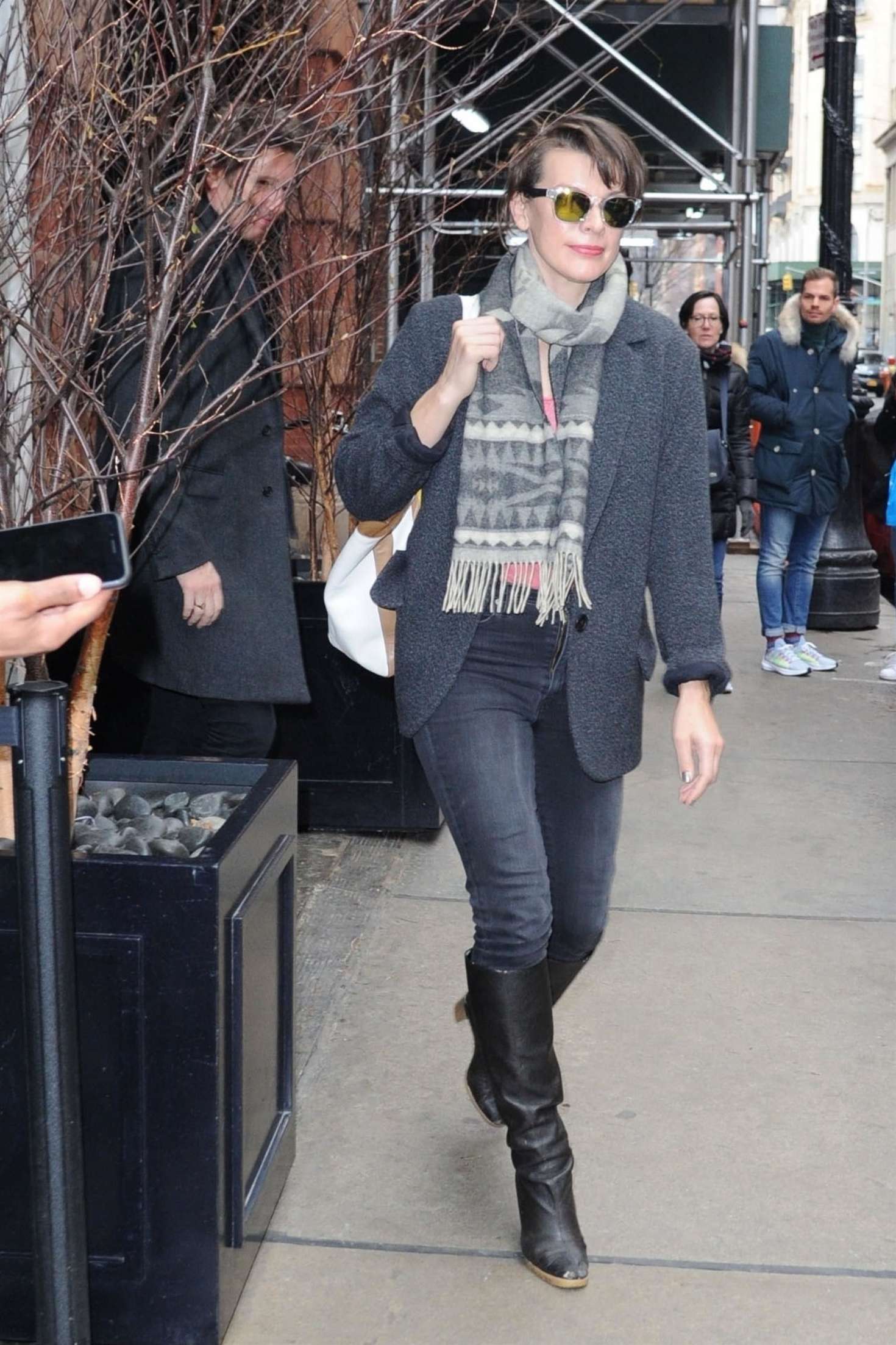 Milla Jovovich - Leaves her hotel in New York