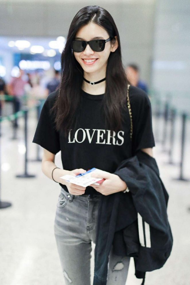 Ming Xi - Arrives at Airport in Shanghai