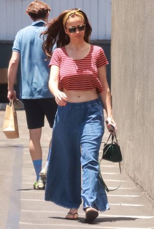 Minka Kelly - Dons some midriff while stopping by her local meat market in Los Feliz