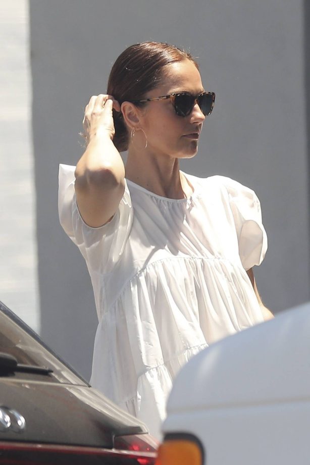 Minka Kelly - Spotted running errands in her white dress in Los Angeles
