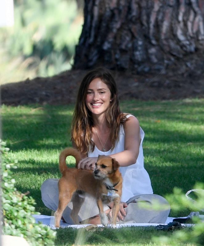 Minka Kelly takes her dog Fred to the park in Beverly Hills