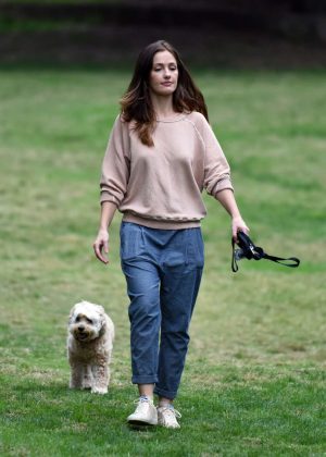 Minka Kelly with her Dogs at a park in Los Angeles
