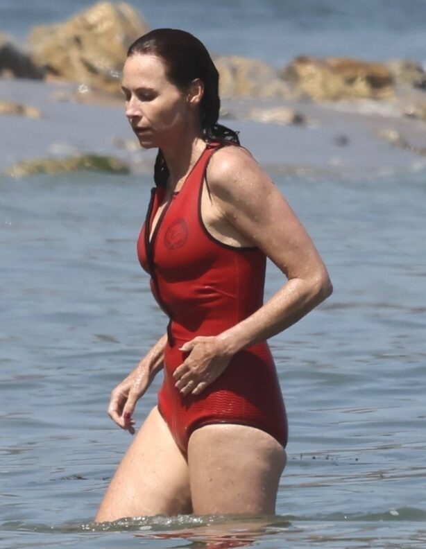 Minnie Driver - Wears a red swimsuit in Malibu