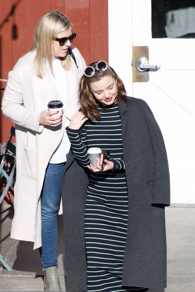 Miranda Kerr - Grabs coffee with a friend in Brentwood