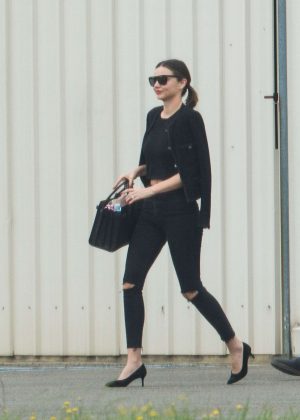 Miranda Kerr in Ripped Jeans Arrive in Sydney