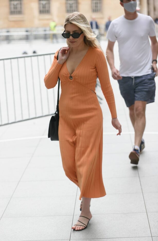 Mollie King - In an orange dress at BBC radio 1 in London