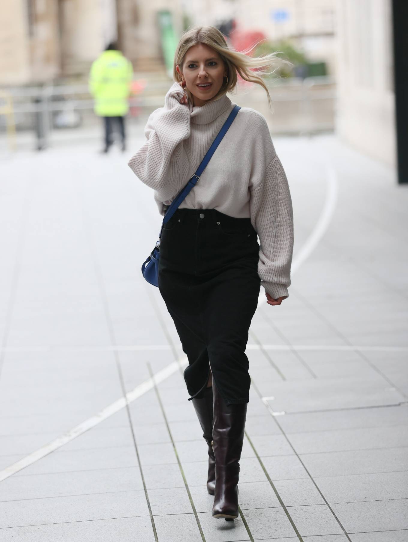 Mollie King - Makes fashionable arrival at BBC Radio 1 in London.