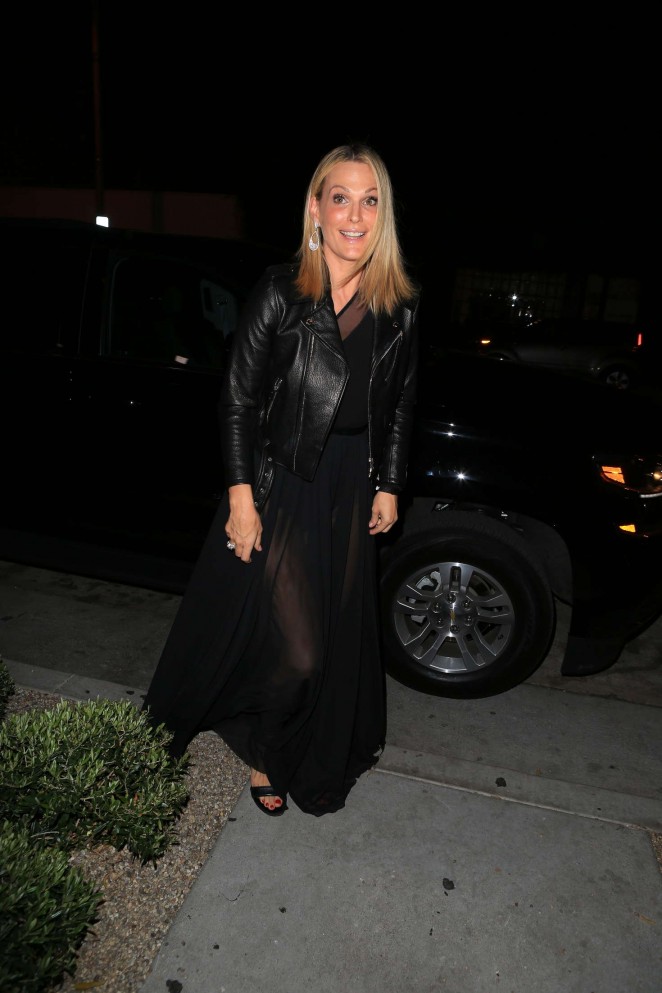Molly Sims in black dress at a restaurant in Hollywood