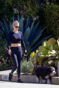 Molly Sims takes her dog for walk