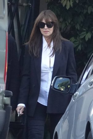 Monica Bellucci - With Tim Burton arrived at Monica's residence in Rome