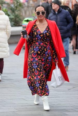 Myleene Klass - In a high split print dress and white leather boots at Smooth radio in London