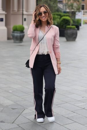 Myleene Klass - In a pink blazer and striped trousers at Smooth radio London