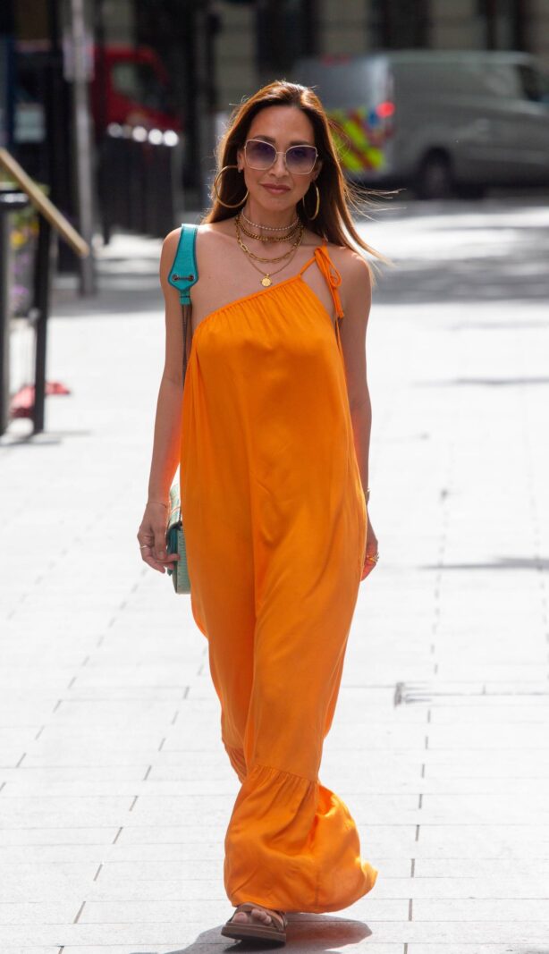 Myleene Klass - In an orange wrap dress at Smooth radio in London