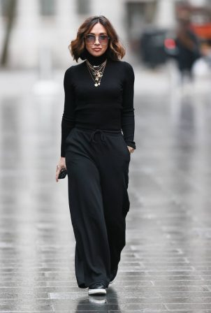 Myleene Klass - In black ribbed jumper and trousers in London