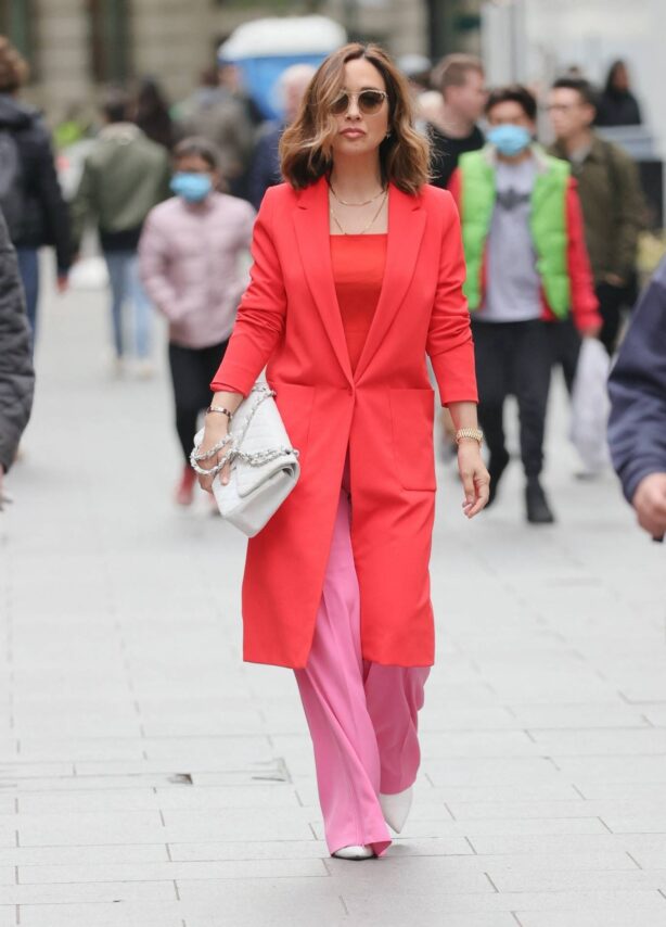 Myleene Klass - Out in neon pink at Smooth radio in London