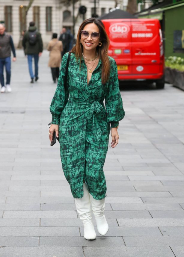 Myleene Klass - Rocks in a green high split dress and heels in London