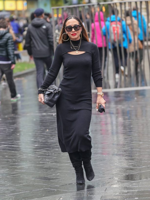 Myleene Klass - Seen wearing a tight black dress in London