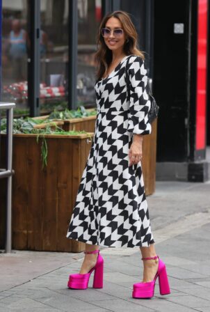 Myleene Klass - Wearing a patterned dress and platform shoes at Smooth radion in London