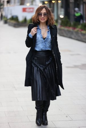 Myleene Klass - Wears a black dress and trench coat at Smooth Radio Studios in London