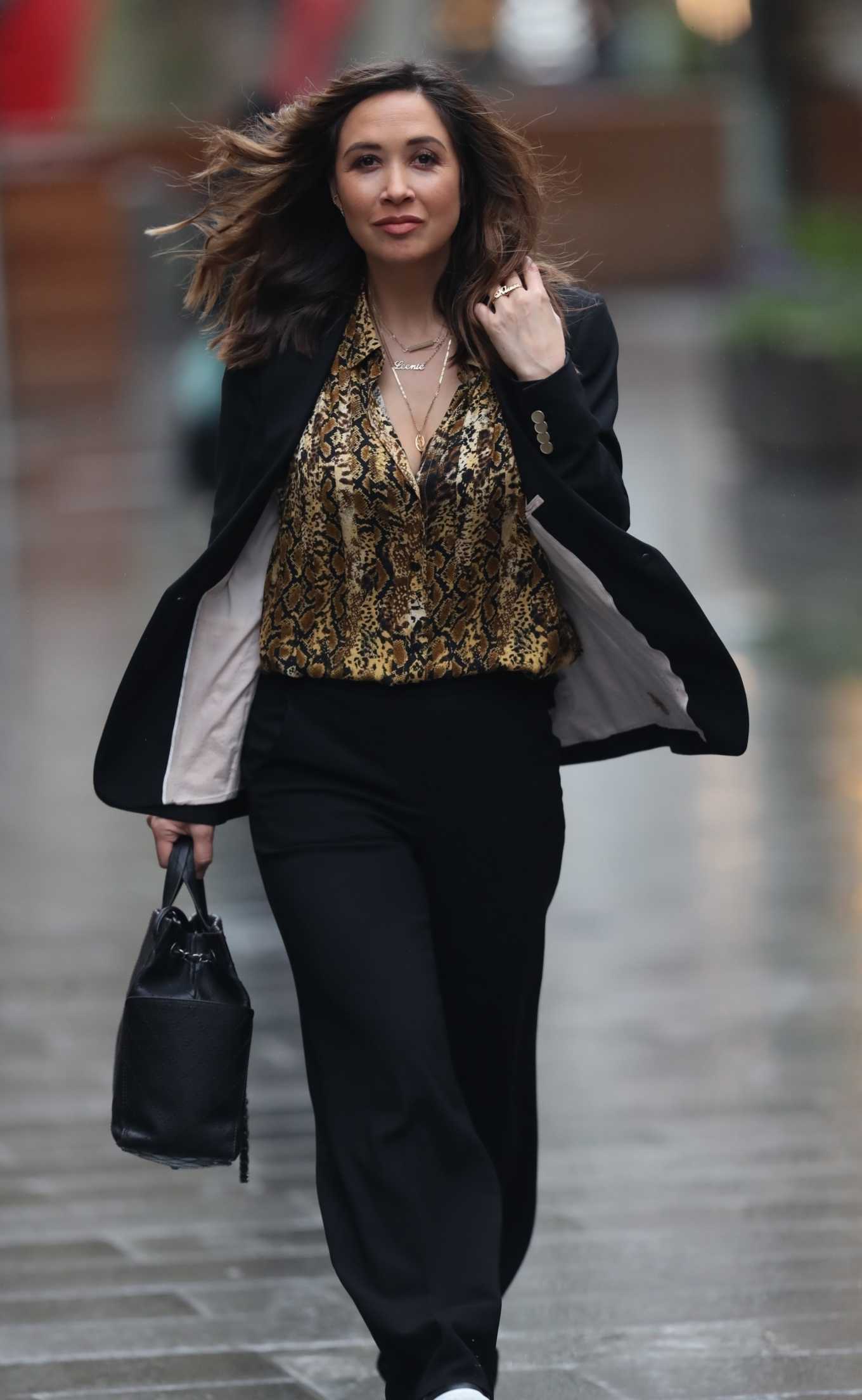 Myleene Klass wears black pantsuit while arrives at Smooth Radio in London