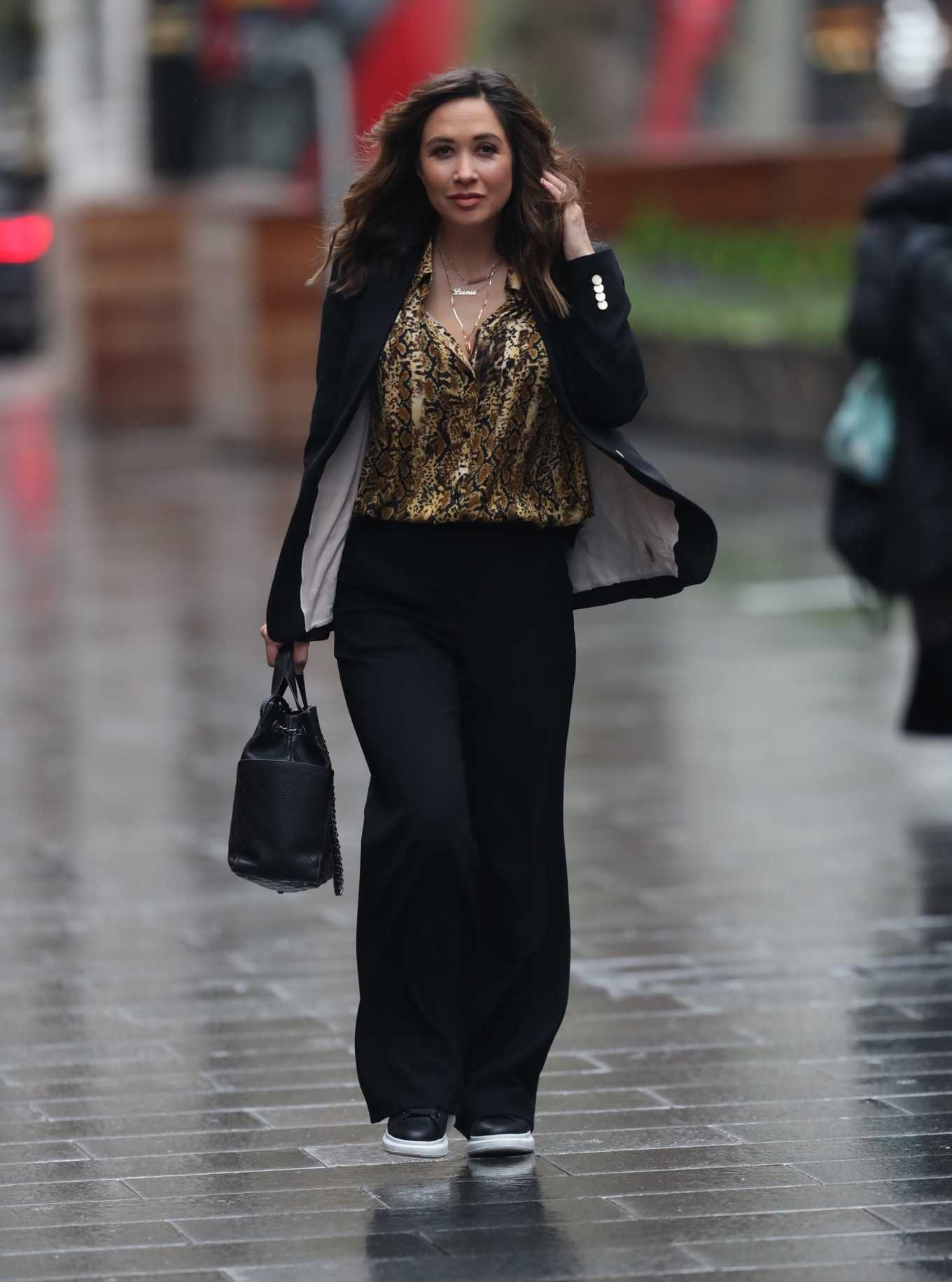 Myleene Klass wears black pantsuit while arrives at Smooth Radio in London