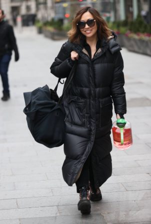 Myleene Klass - With energy drink after gruelling Dancing On Ice training session