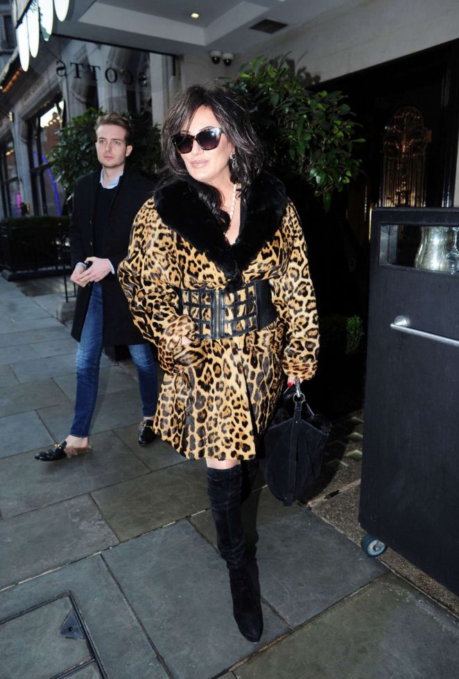Nancy O'Dell in Leopard Print Coat Out in London