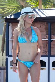 Naomi Isted in Blue Bikini on the beach in the Caribbean