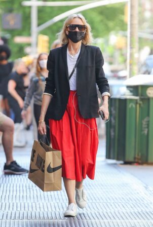 Naomi Watts - in a red skirt aseen after a stroll with a friend in New York