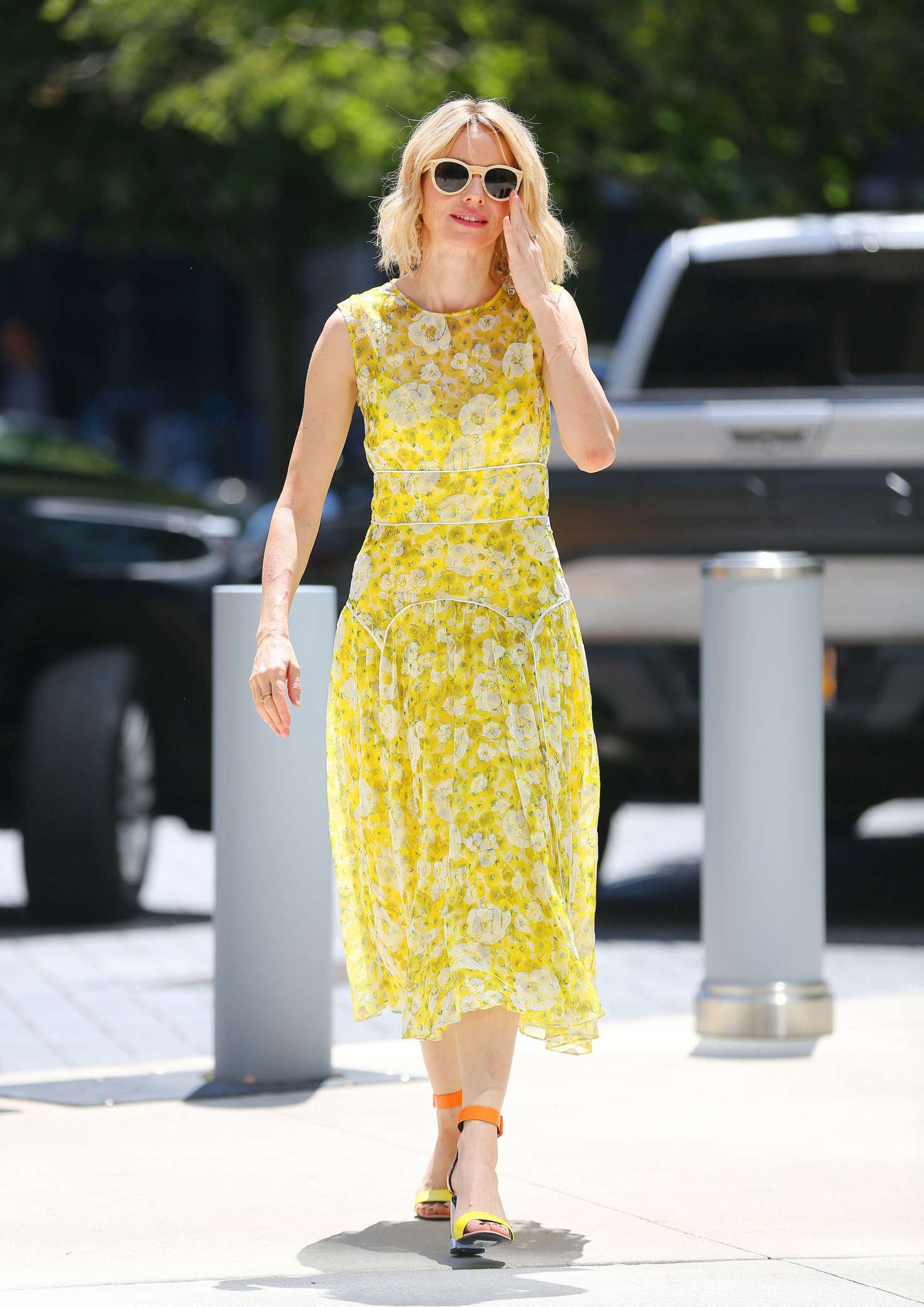 Naomi Watts in a yellow floral dress out in New York City