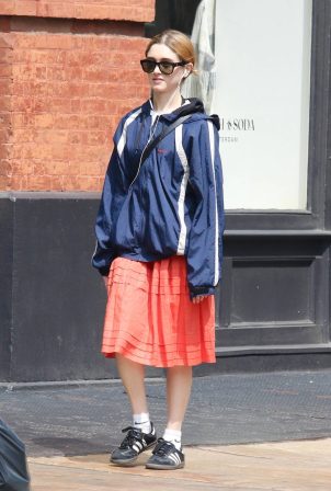Natalia Dyer - Dons a navy Nike jacket during a stroll in Manhattan’s Soho Neighborhood