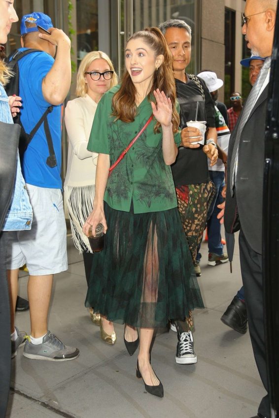 Natalia Dyer in Green emerald outfit in NYC
