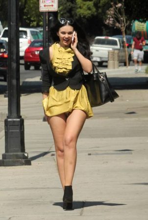 Natasha Blasick - Wears a short gold dress on a windy day in Hollywood