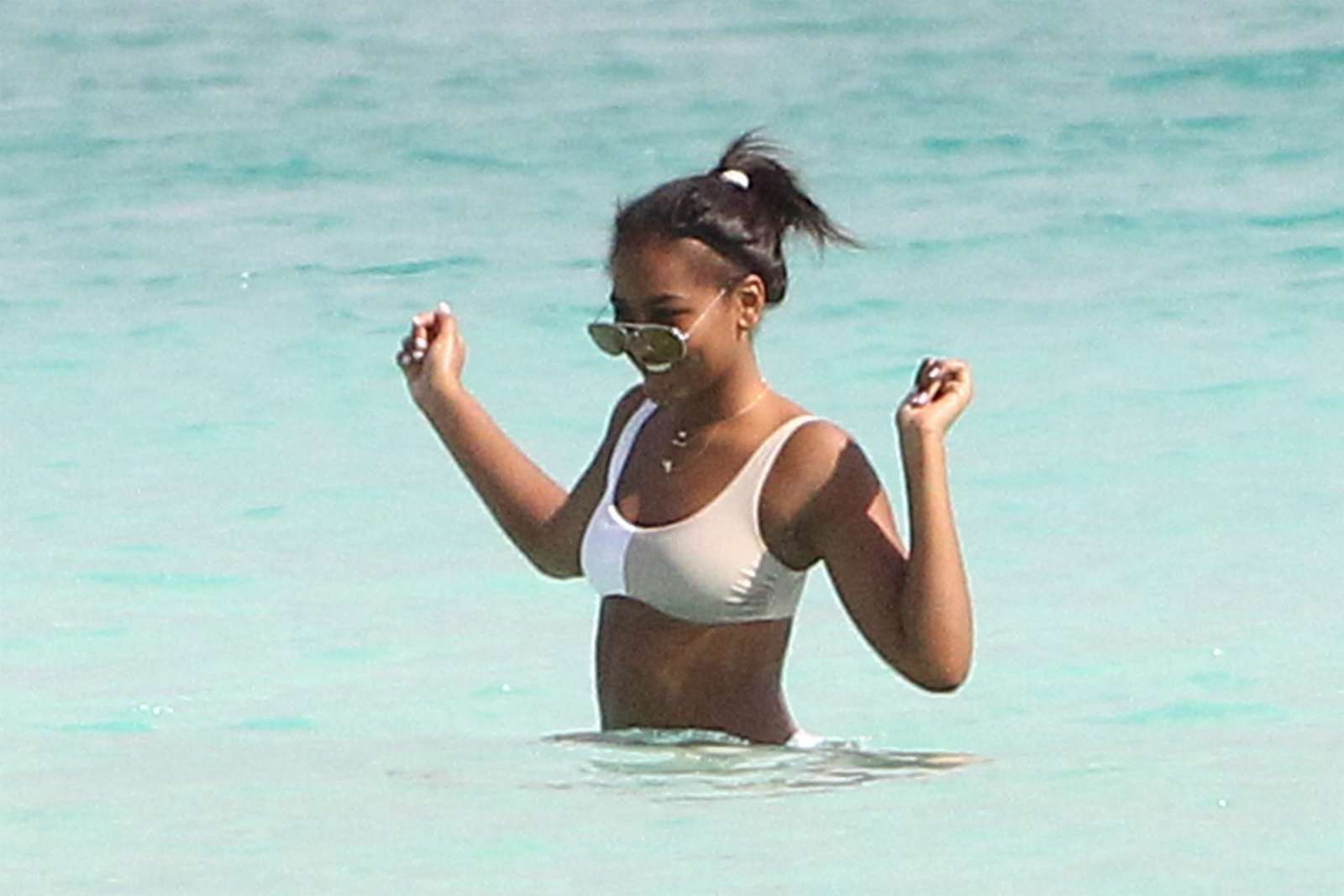 Natasha Obama in White Bikini on the beach in Cancun. 
