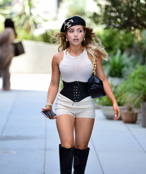 Nathalie Paris - Wearing corset and knee high boots in LA