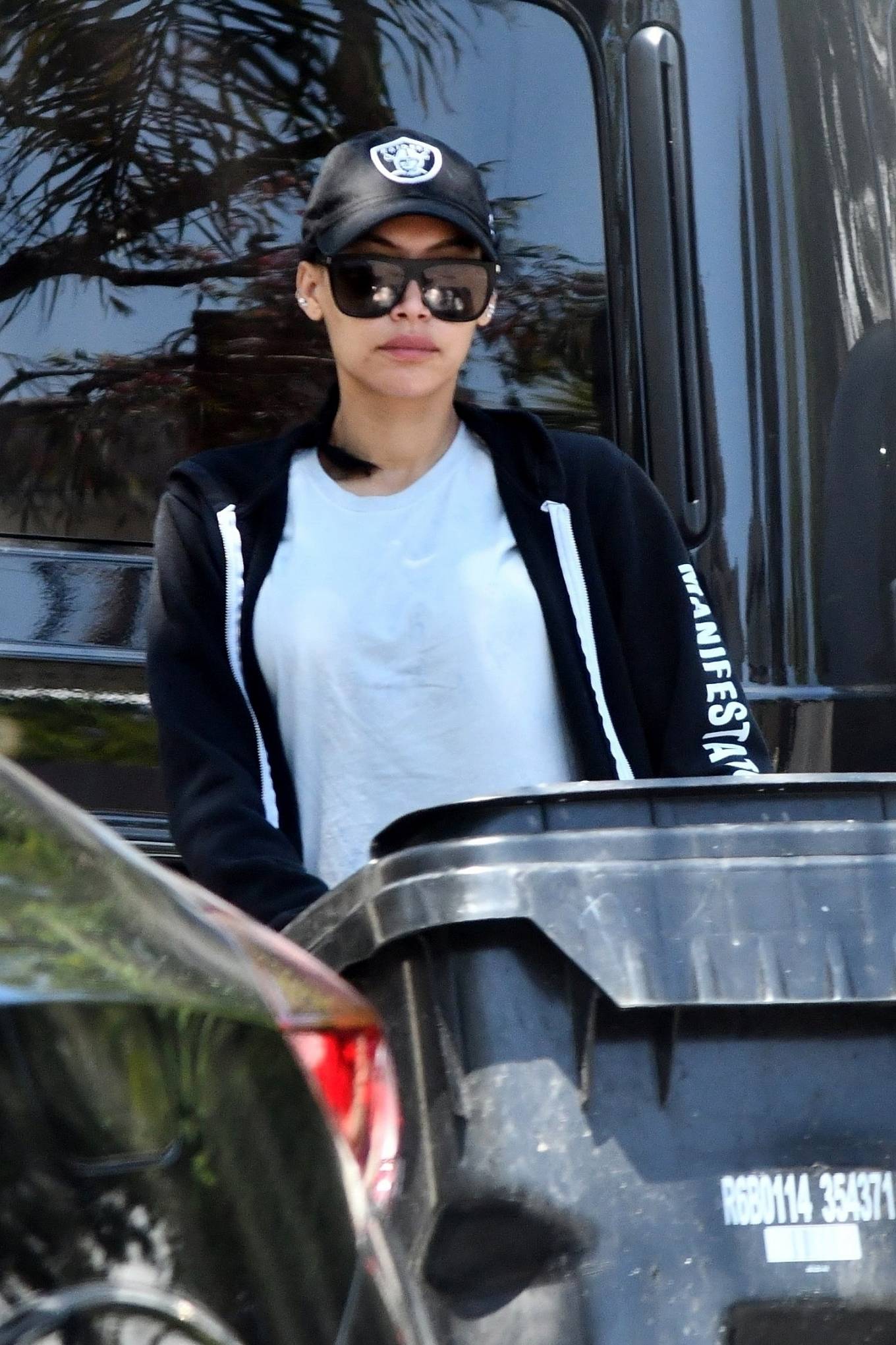 Naya Rivera in Tights â€“ Steps out to grab her trash cans after garbage day in Los Feliz