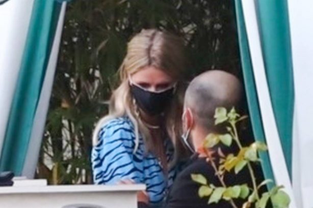 Nicky Hilton - gets her temperature checked in Los Angeles