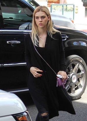 Nicola Peltz in Black Ripped Jeans out in Beverly Hills