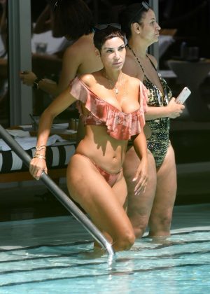 Nicole Murphy in Pink Bikini at the pool in Miami