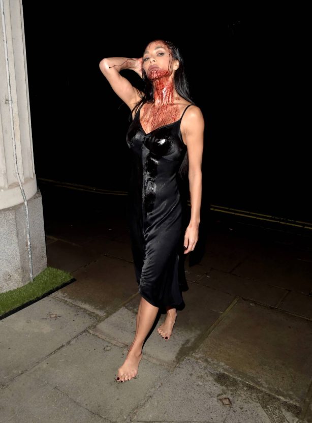 Nicole Scherzinger - In costume with fake blood all over her face and body in London