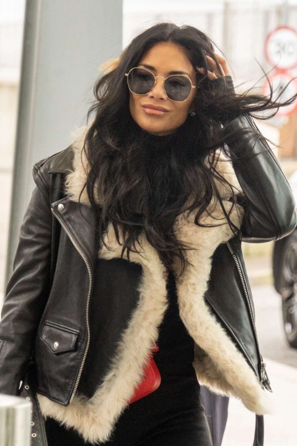 Nicole Scherzinger spotted flying out of Heathrow Airport to Los Angeles