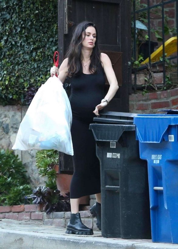 Nicole Trunfio taking out the trash