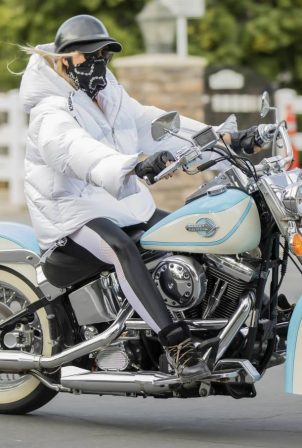Nicollette Sheridan - Driving a Harley Davidson around Calabasas