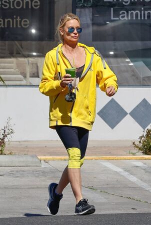 Nicollette Sheridan - In black and yellow seen after workout session in Calabasas