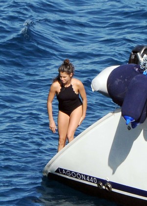 Nikki Reed in Black Swimsuit in Italy