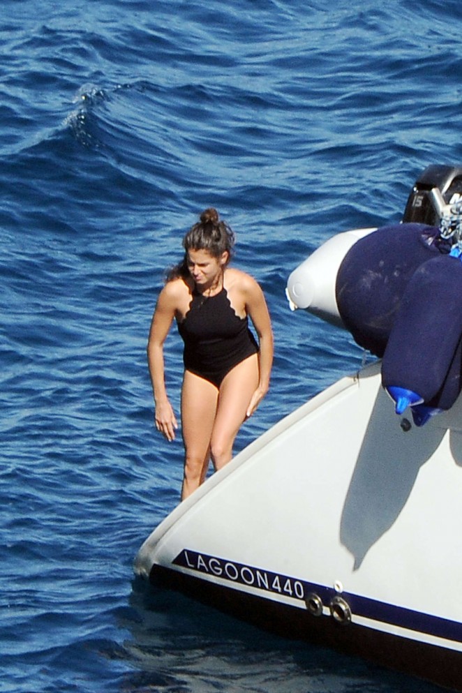 Nikki Reed in Black Swimsuit in Italy