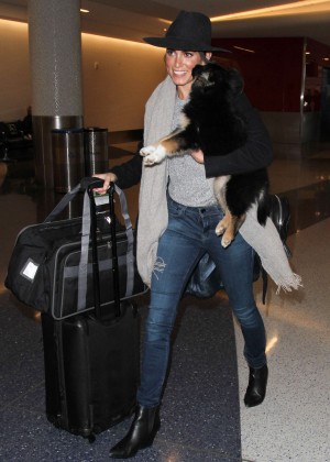 Nikki Reed with her dog at LAX in Los Angeles