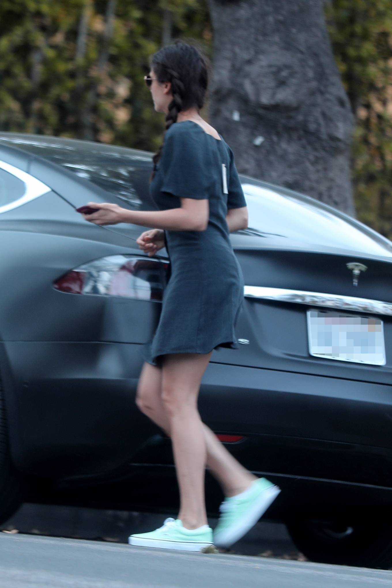 Nina Dobrev â€“ Forgets to remove the tag from her dress in West Hollywood