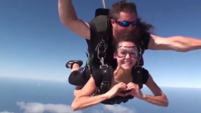 Nina Dobrev - Goes skydiving